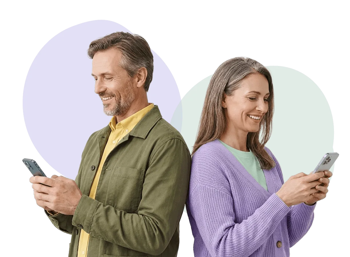 A man and woman using their phones